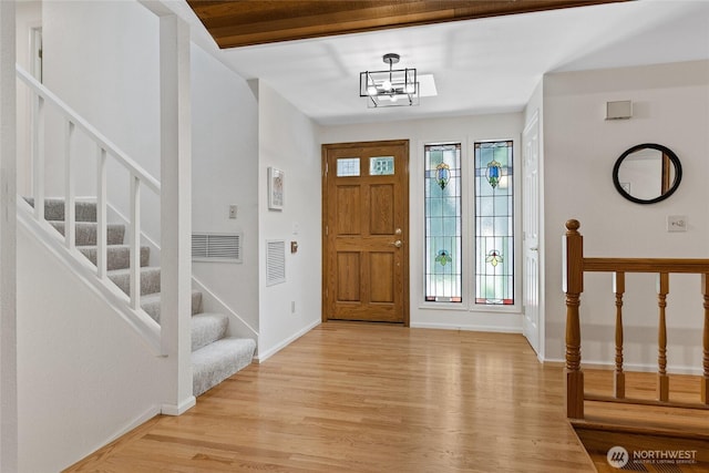 3420 210th Pl NE, Sammamish, WA 98074 - foyer featuring stairway, light wood-style floors, and a chandelier