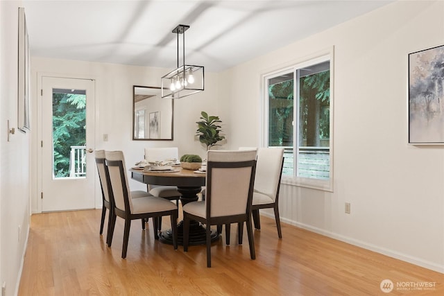 3420 210th Pl NE, Sammamish, WA 98074 - dining area featuring light wood-type flooring, plenty of natural light, and a chandelier