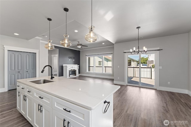 1300 W Marina Dr Unit 33, Moses Lake, WA 98837 - kitchen featuring a fireplace, dark wood finished floors, open floor plan, ceiling fan, and recessed lighting