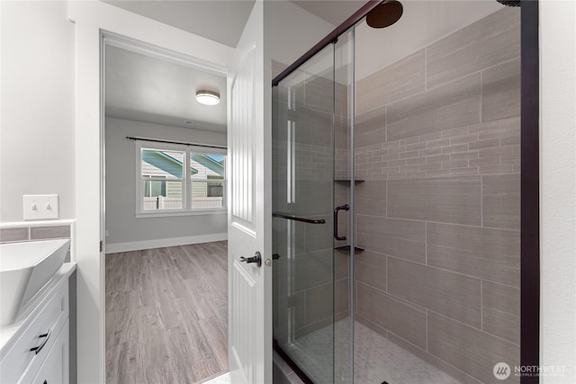 1300 W Marina Dr Unit 33, Moses Lake, WA 98837 - full bath with a shower stall, vanity, and wood finished floors