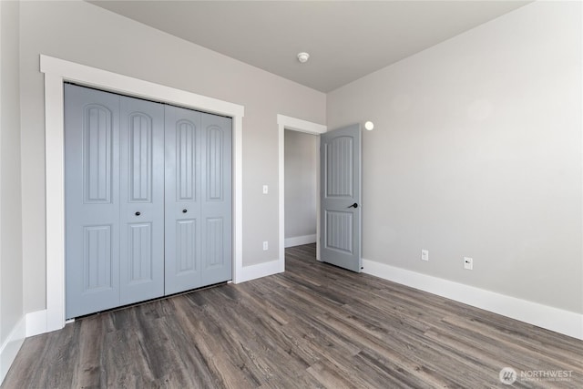 1300 W Marina Dr Unit 33, Moses Lake, WA 98837 - unfurnished bedroom with wood finished floors and a closet