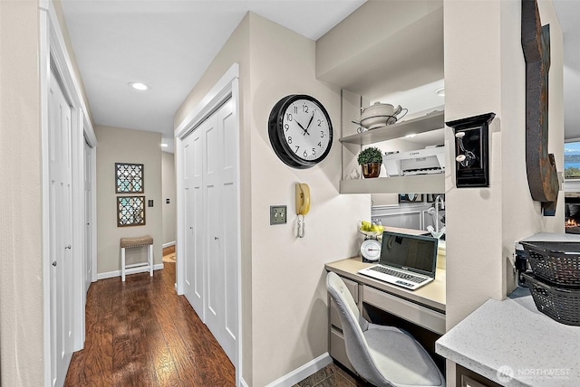 2313 S Cedar St Unit 107, Tacoma, WA 98405 - hall featuring dark wood finished floors, a desk, and recessed lighting