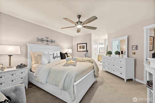 2313 S Cedar St Unit 107, Tacoma, WA 98405 - bedroom featuring light colored carpet, ensuite bath, and ceiling fan