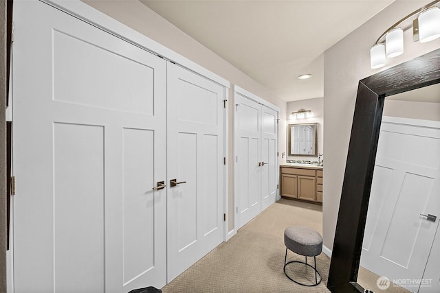2313 S Cedar St Unit 107, Tacoma, WA 98405 - hallway featuring light colored carpet and recessed lighting