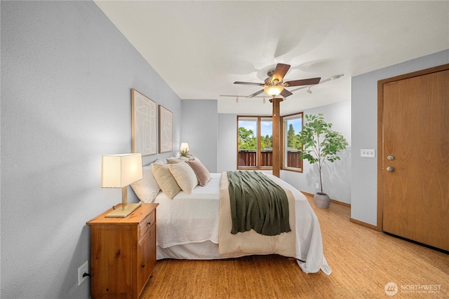 3519 N Union Ave Unit 2, Tacoma, WA 98407 - bedroom with baseboards and ceiling fan