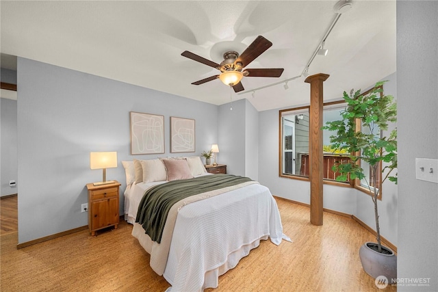 3519 N Union Ave Unit 2, Tacoma, WA 98407 - bedroom featuring track lighting, light wood-style floors, and a ceiling fan