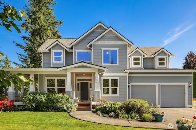 32701 SE 43rd St, Fall City, WA 98024 - craftsman-style house with driveway, an attached garage, and a front yard