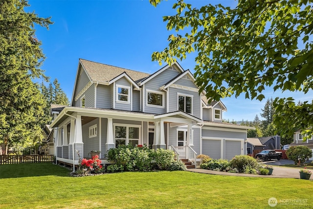 32701 SE 43rd St, Fall City, WA 98024 - view of front of home with a garage, a shingled roof, concrete driveway, and covered porch