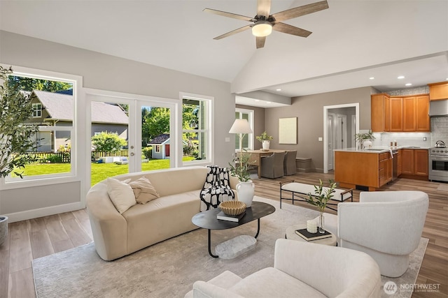 32701 SE 43rd St, Fall City, WA 98024 - living area featuring light wood-type flooring, healthy amount of natural light, a ceiling fan, recessed lighting, and high vaulted ceiling
