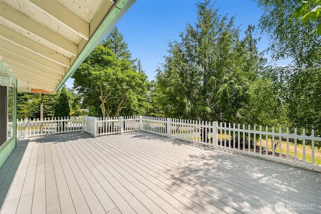 24 Makah Way, La Conner, WA 98257 - wooden terrace with view of scattered trees