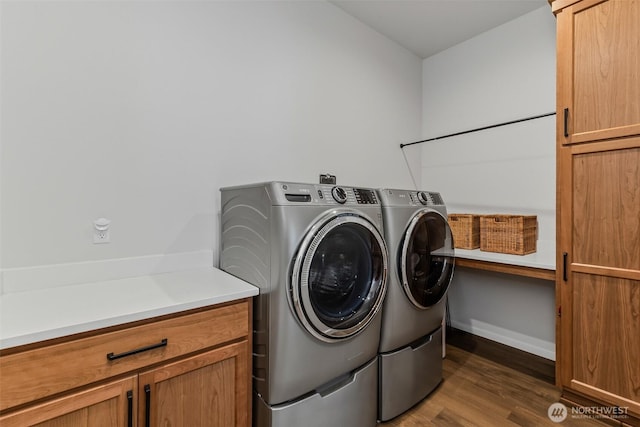18500 NE 79th, Vancouver, WA 98682 - washroom with washer and clothes dryer, wood finished floors, and cabinet space