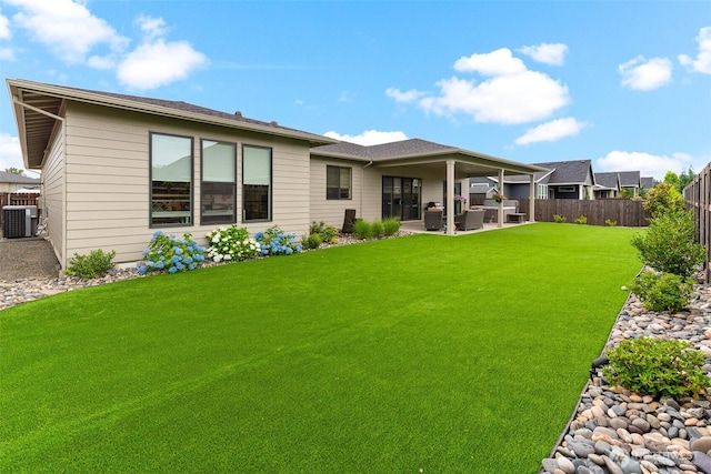 18500 NE 79th, Vancouver, WA 98682 - back of house featuring a fenced backyard, a patio, and an outdoor living space