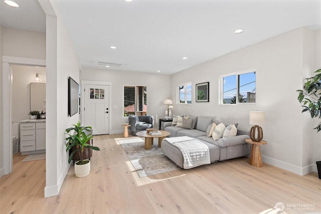 320 NW 51st St Unit A, Seattle, WA 98107 - living room featuring light wood-style floors and recessed lighting
