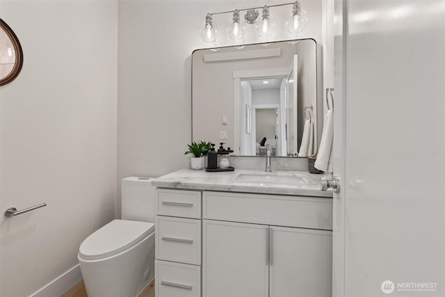 320 NW 51st St Unit A, Seattle, WA 98107 - bathroom featuring toilet and vanity
