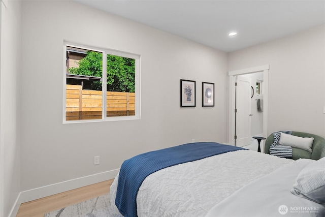 320 NW 51st St Unit A, Seattle, WA 98107 - bedroom featuring wood finished floors and recessed lighting