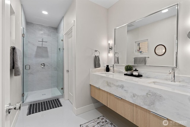 320 NW 51st St Unit A, Seattle, WA 98107 - bathroom with double vanity, a stall shower, and recessed lighting