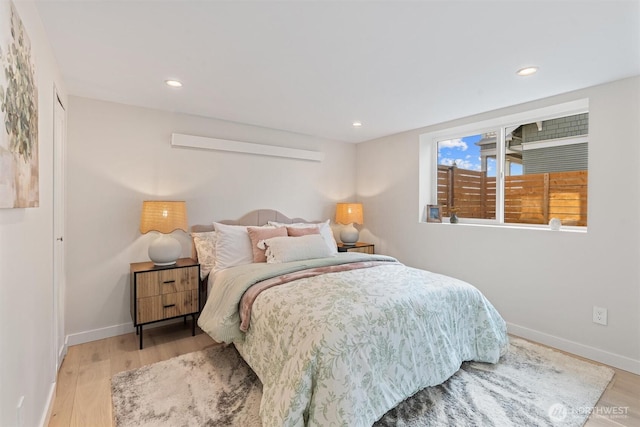 320 NW 51st St Unit A, Seattle, WA 98107 - bedroom featuring light wood-style floors and recessed lighting