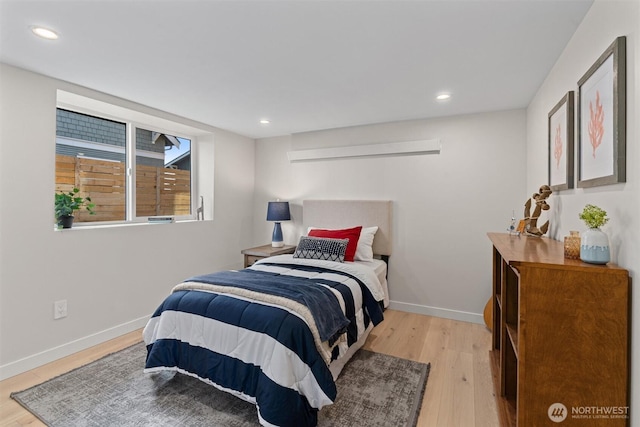 320 NW 51st St Unit A, Seattle, WA 98107 - bedroom featuring wood finished floors and recessed lighting