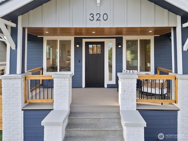 320 NW 51st St Unit A, Seattle, WA 98107 - view of exterior entry with a porch