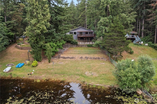 9910 Fairview Lake Rd SW, Port Orchard, WA 98367 - aerial view of property and surrounding area with a heavily wooded area and a nearby body of water