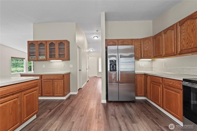 9910 Fairview Lake Rd SW, Port Orchard, WA 98367 - kitchen featuring stainless steel appliances, brown cabinetry, and light countertops