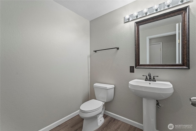 9910 Fairview Lake Rd SW, Port Orchard, WA 98367 - bathroom with wood finished floors and toilet