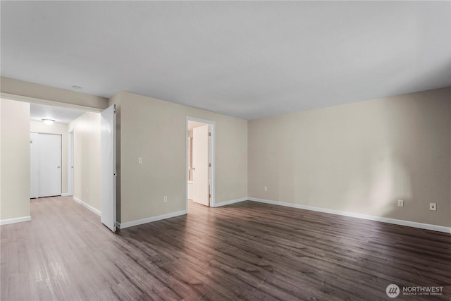 9910 Fairview Lake Rd SW, Port Orchard, WA 98367 - empty room with wood finished floors