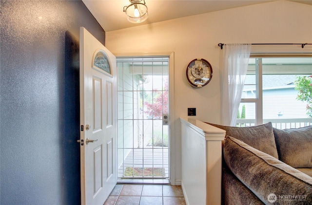 4031 Alyssa Ct, Bellingham, WA 98226 - entryway with lofted ceiling, plenty of natural light, light tile patterned flooring, and a textured wall