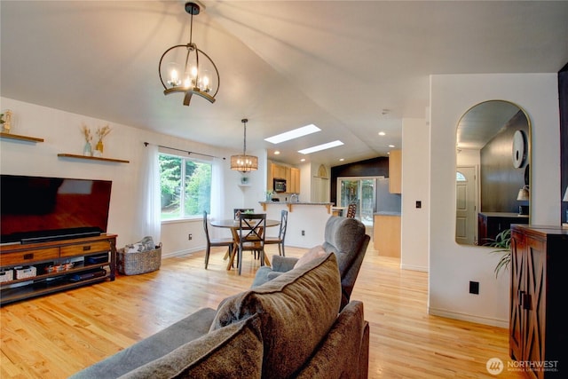 4031 Alyssa Ct, Bellingham, WA 98226 - living area featuring a chandelier, lofted ceiling, light wood-style flooring, a skylight, and recessed lighting