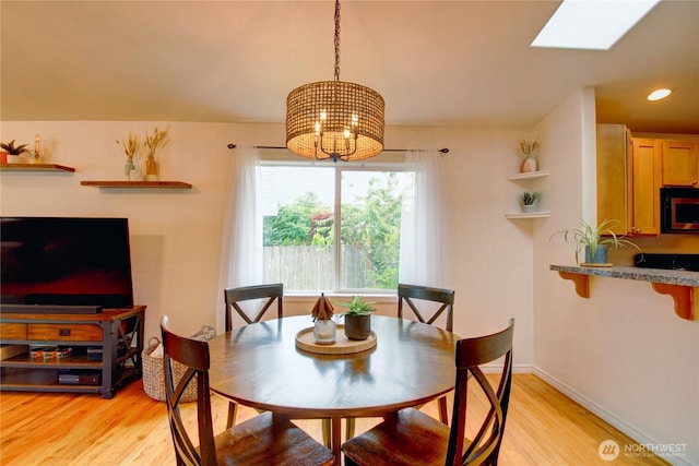 4031 Alyssa Ct, Bellingham, WA 98226 - dining area with light wood-type flooring, a chandelier, and recessed lighting