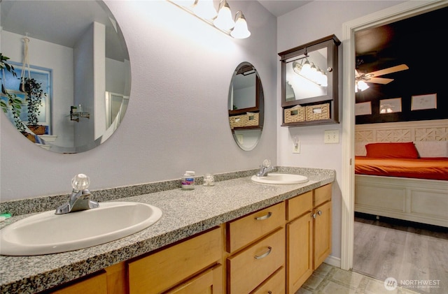 4031 Alyssa Ct, Bellingham, WA 98226 - full bathroom with double vanity, ensuite bath, and a ceiling fan