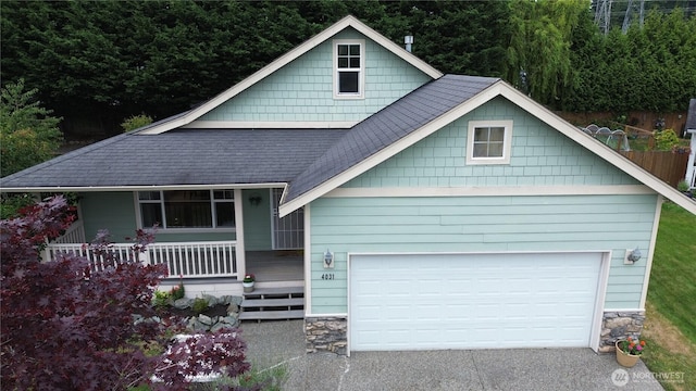 4031 Alyssa Ct, Bellingham, WA 98226 - view of front of house featuring a porch, driveway, a shingled roof, and stone siding