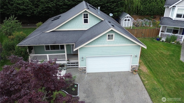 4031 Alyssa Ct, Bellingham, WA 98226 - craftsman-style home with covered porch, driveway, stone siding, and a garage