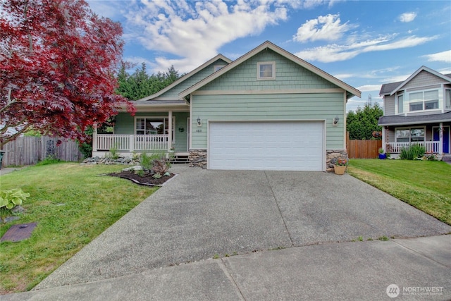 4031 Alyssa Ct, Bellingham, WA 98226 - craftsman-style house with covered porch, stone siding, concrete driveway, and an attached garage