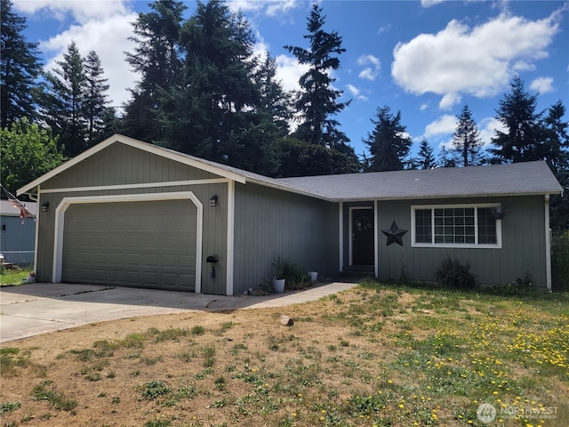 17311 154th Way SE, Yelm, WA 98597 - single story home with a garage, concrete driveway, and a front lawn