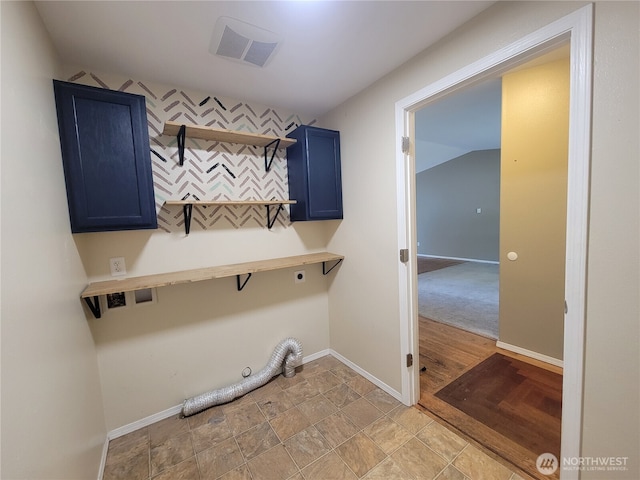 17311 154th Way SE, Yelm, WA 98597 - laundry room featuring cabinet space and hookup for an electric dryer