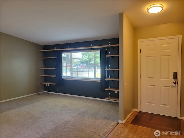 17311 154th Way SE, Yelm, WA 98597 - carpeted foyer with baseboards and wood finished floors