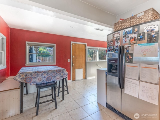 1018 Vassar Ave, Wenatchee, WA 98801 - kitchen featuring stainless steel refrigerator with ice dispenser and tile patterned floors