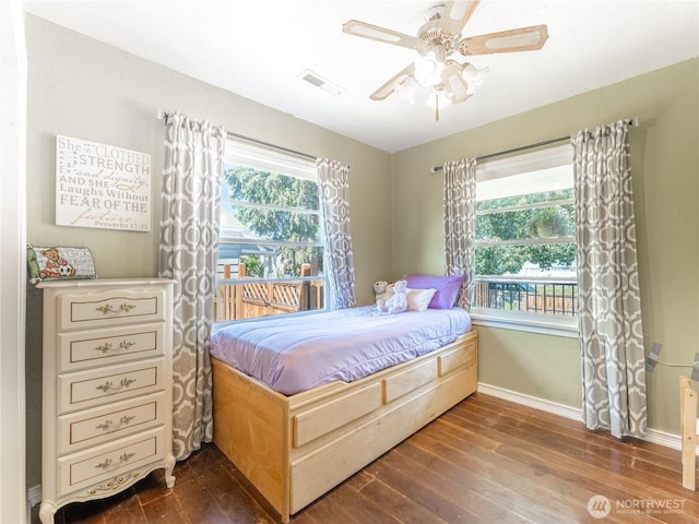 1018 Vassar Ave, Wenatchee, WA 98801 - bedroom featuring dark wood-style floors, multiple windows, and ceiling fan