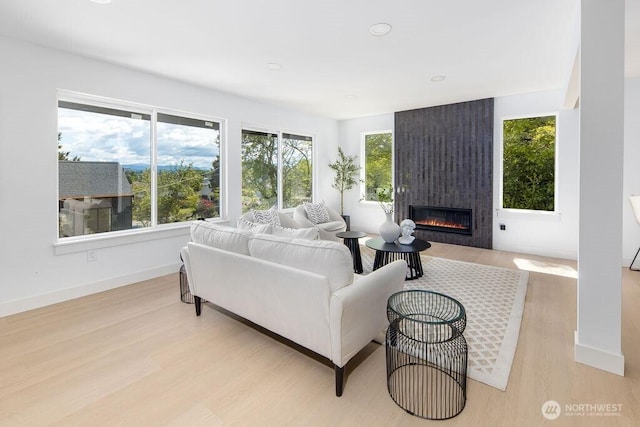 2216 18th Ave S, Seattle, WA 98144 - living room with a fireplace, light wood-type flooring, and recessed lighting