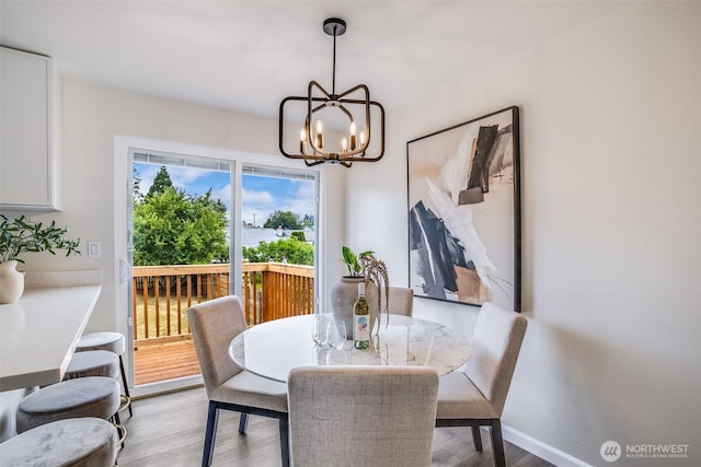 1415S 93rd St, Tacoma, WA 98444 - dining space with a chandelier and wood finished floors