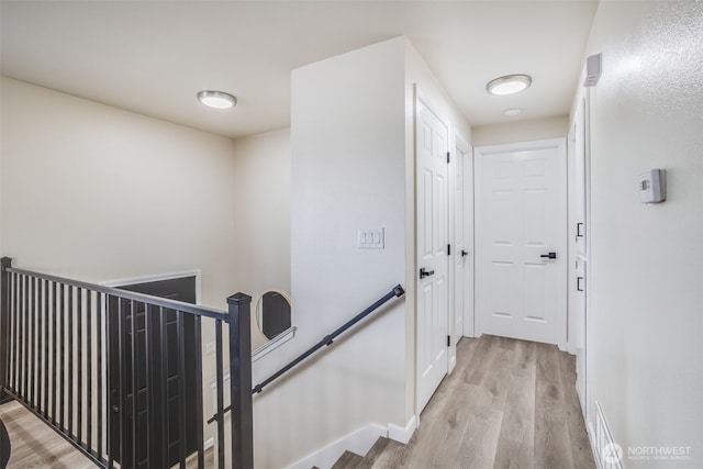 1415S 93rd St, Tacoma, WA 98444 - hall with an upstairs landing and light wood-style flooring
