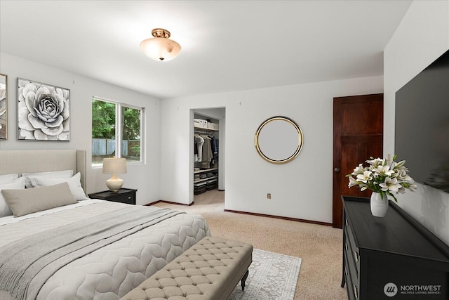 17722 6th Ave W, Bothell, WA 98012 - bedroom featuring light carpet, a walk in closet, and a closet