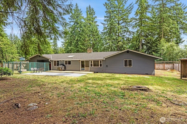 17722 6th Ave W, Bothell, WA 98012 - back of property featuring a patio, a chimney, a fenced backyard, and an outdoor fire pit