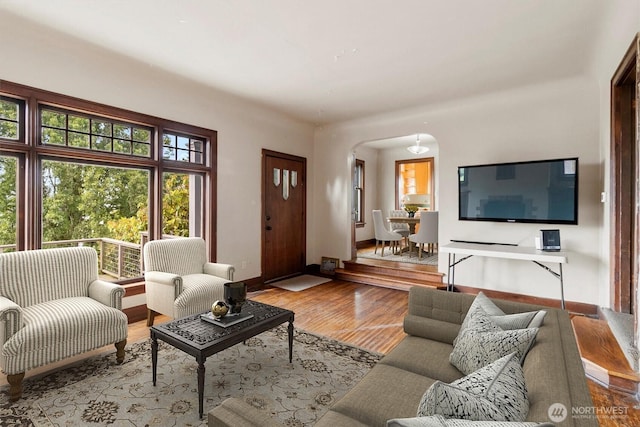 720 N Forest St, Bellingham, WA 98225 - living room featuring wood finished floors and arched walkways
