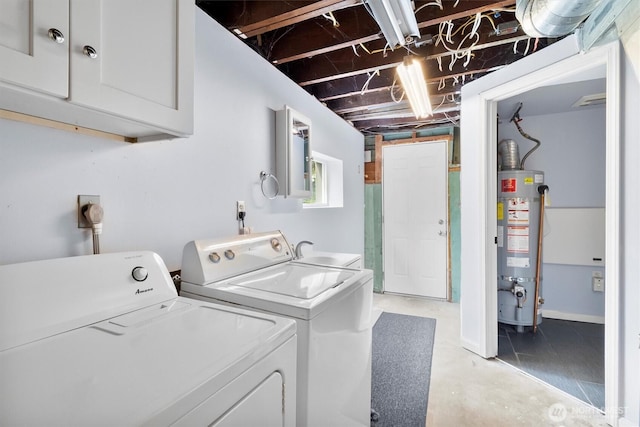 720 N Forest St, Bellingham, WA 98225 - washroom featuring cabinet space, water heater, and washing machine and dryer