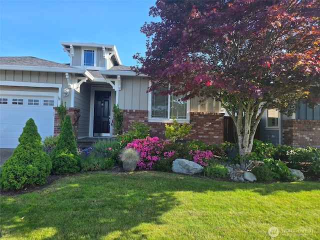 8542 Bainbridge Loop NE, Lacey, WA 98516 - view of front facade featuring brick siding, board and batten siding, a garage, a front yard, and a shingled roof