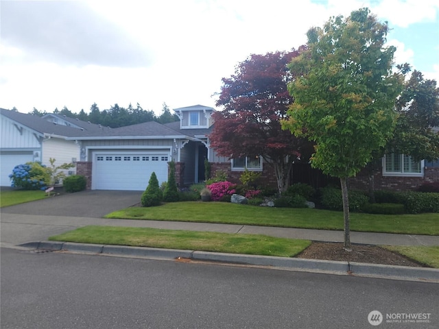 8542 Bainbridge Loop NE, Lacey, WA 98516 - obstructed view of property featuring driveway, a garage, brick siding, and a front yard