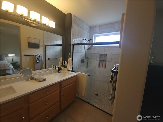 8542 Bainbridge Loop NE, Lacey, WA 98516 - ensuite bathroom featuring a tile shower, double vanity, and tile patterned flooring