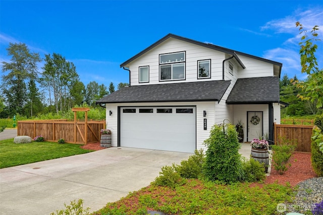 2649 Sandwood Ln, Blaine, WA 98230 - view of front of house featuring a garage, a shingled roof, and concrete driveway